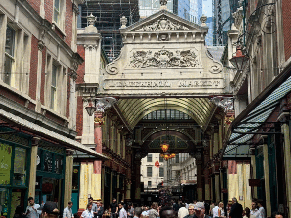 phone repair in leadenhall market. best phone repair services in london . picture showing gate of leaden hall market where people are moving here and there